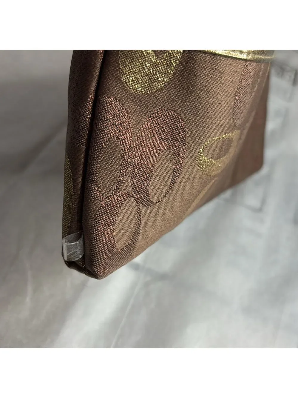 Brown and Gold Signatures Patterned Clutch